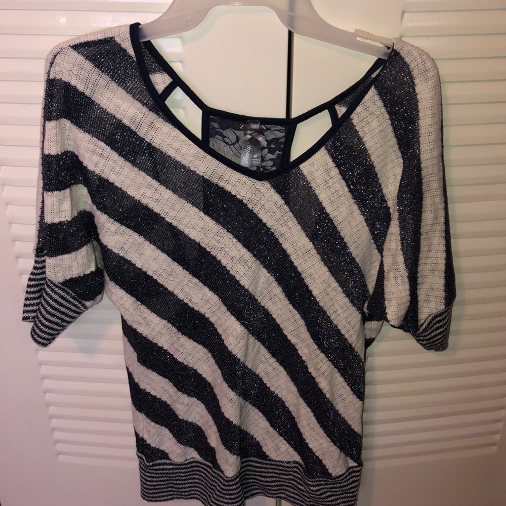 A dressy opened back vanity blouse